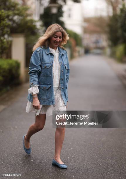 Yasmin von Schlieffen-Nannen seen wearing Isabel Marant white ruffled lace short dress, Blaze blue denim jacket, Cartier yellow gold Love bracelet...