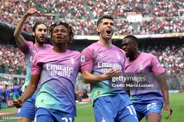 Christian Pulisic of AC Milan celebrates scoring his team's first goal with teammate Samuel Chukwueze during the Serie A TIM match between AC Milan...