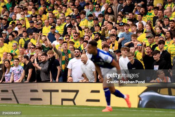 Norwich City fans gesture towards a Ipswich Town player during the Sky Bet Championship match between Norwich City and Ipswich Town at Carrow Road on...