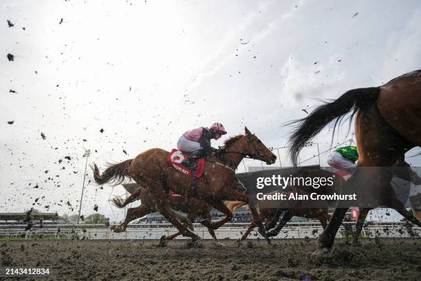 General view as runners pass the grandstand on the first circuit during The at Kempton Park Racecourse on April 06, 2024 in Sunbury, England.