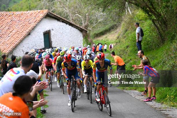 Tao Geoghegan Hart of The United Kingdom and Andrea Bagioli of Italy and Team Lidl - Trek lead the peloton while fans cheer during the 63rd Itzulia...