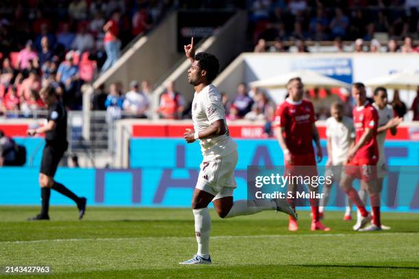 Serge Gnabry of Bayern Munich celebrates scoring his team's second goal during the Bundesliga match between 1. FC Heidenheim 1846 and FC Bayern...