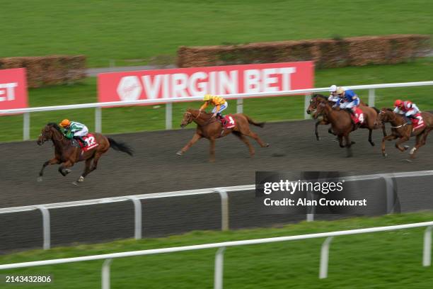 Saffie Osborne riding Duty Of Care win The Virgin Bet Queen's Prize Handicap at Kempton Park Racecourse on April 06, 2024 in Sunbury, England.