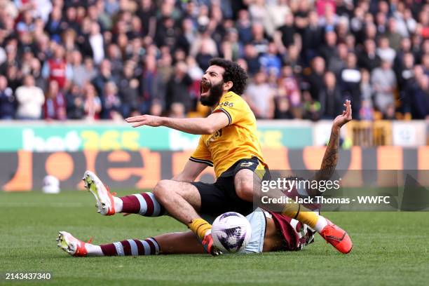 Rayan Ait-Nouri of Wolverhampton Wanderers is fouled by Emerson Palmieri of West Ham United, resulting in a penalty kick awarded to Wolverhampton...