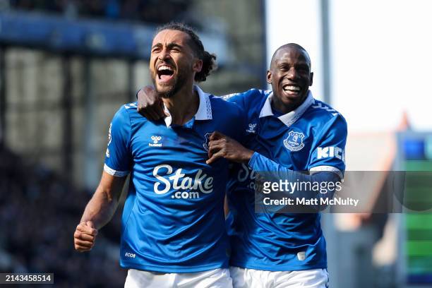 Dominic Calvert-Lewin of Everton celebrates scoring his team's first goal with teammate Abdoulaye Doucoure during the Premier League match between...