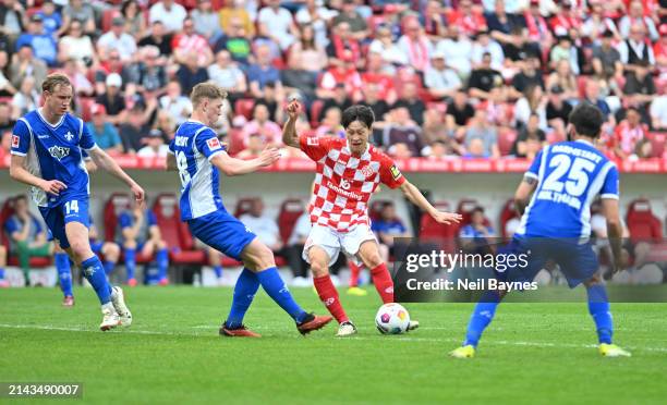 Lee Jae-Song of 1.FSV Mainz 05 scores his team's fourth goal during the Bundesliga match between 1. FSV Mainz 05 and SV Darmstadt 98 at MEWA Arena on...