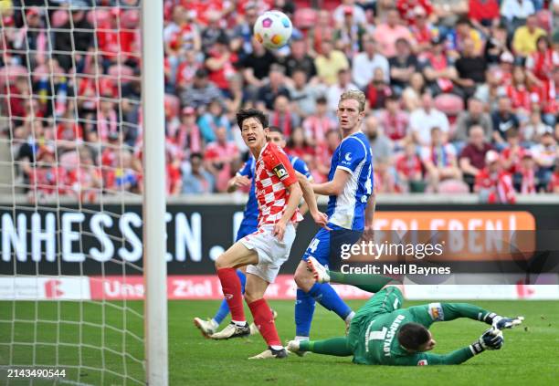 Lee Jae-Song of 1.FSV Mainz 05 scores his team's fourth goal during the Bundesliga match between 1. FSV Mainz 05 and SV Darmstadt 98 at MEWA Arena on...