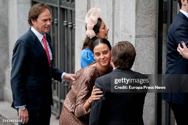 The granddaughter of King Juan Carlos I, Victoria Federica de Marichalar, greets the mayor of Madrid, Jose Luis Martinez-Almeida, on her arrival at...