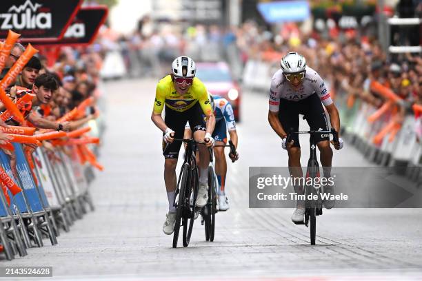 Mattias Skjelmose of Denmark and Team Lidl - Trek - Yellow Leader Jersey and Marc Soler of Spain and UAE Team Emirates cross the finish line during...