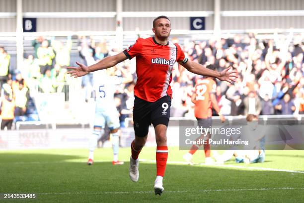Carlton Morris of Luton Town celebrates scoring his team's second goal during the Premier League match between Luton Town and AFC Bournemouth at...