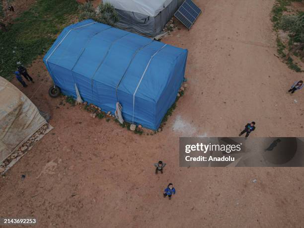 An aerial view of the tent city as civilians who were forcibly displaced by the attacks of Bashar al-Assad regime forces and forced to live in camps...