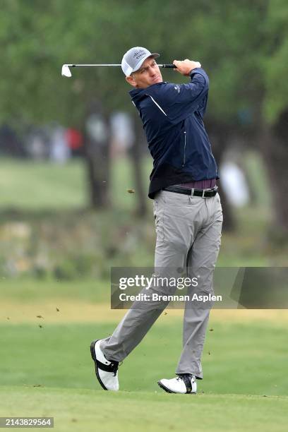 Brendon Todd of the United States plays his second shot on the 1st hole during the third round of the Valero Texas Open at TPC San Antonio on April...