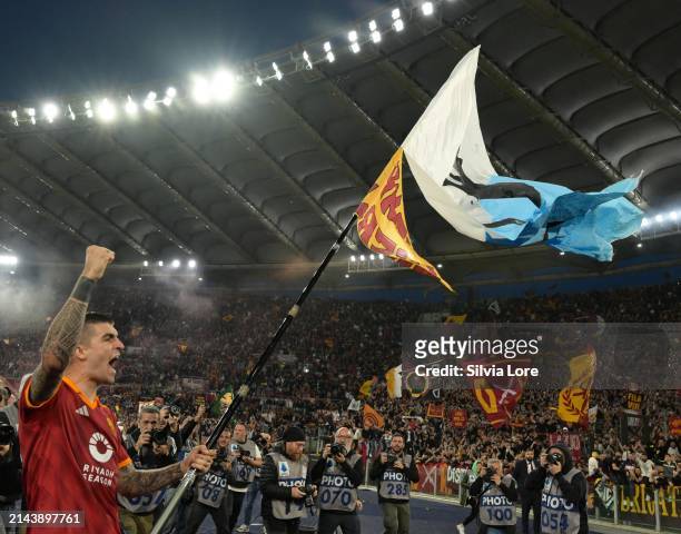 Gianluca Mancini of AS Roma celebrates the victory and the flag flies against Lazio at the end of the Serie A TIM match between AS Roma and SS Lazio...