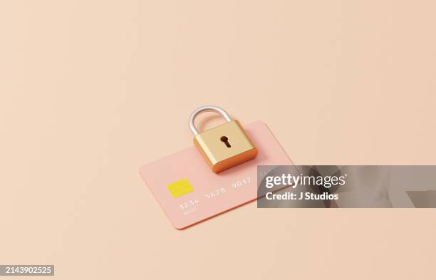 padlock on top of a credit card - roubo empresarial imagens e fotografias de stock