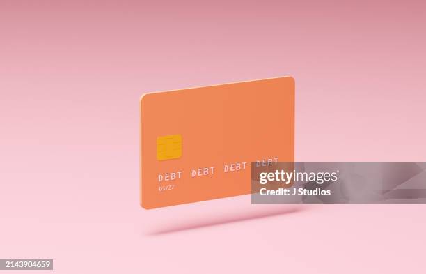credit card spelling debt instead of numbers - carte de crédit photos et images de collection