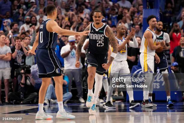Washington of the Dallas Mavericks reacts after scoring during the second half against the Golden State Warriors at American Airlines Center on April...