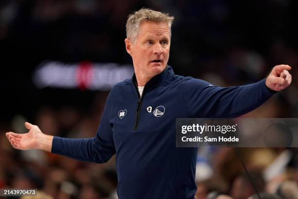 Golden State Warriors head coach Steve Kerr reacts during the first half against the Dallas Mavericks at American Airlines Center on April 05, 2024...