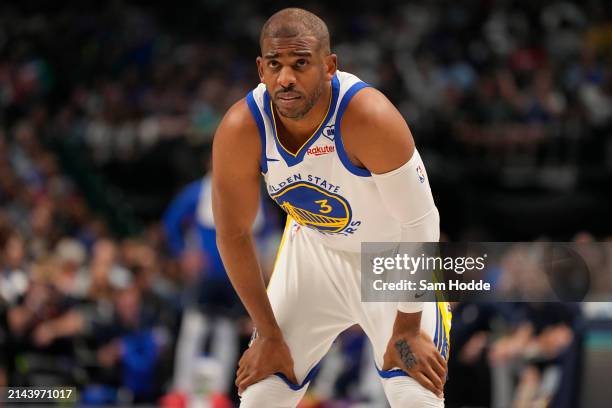 Chris Paul of the Golden State Warriors looks on during the first half against the Dallas Mavericks at American Airlines Center on April 05, 2024 in...