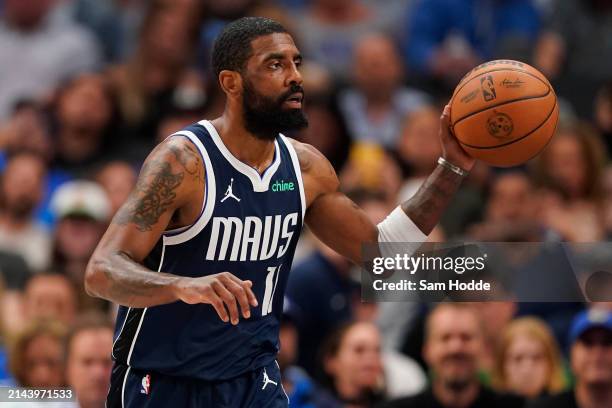 Kyrie Irving of the Dallas Mavericks passes the ball during the first half against the Golden State Warriors at American Airlines Center on April 05,...