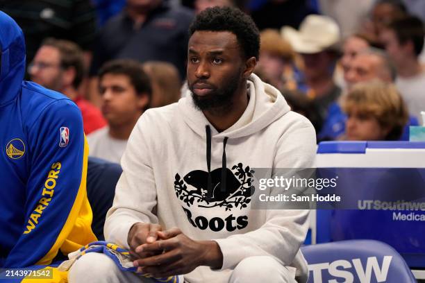 Andrew Wiggins of the Golden State Warriors looks on during the first half against the Dallas Mavericks at American Airlines Center on April 05, 2024...