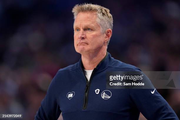 Golden State Warriors head coach Steve Kerr looks on during the first half against the Dallas Mavericks at American Airlines Center on April 05, 2024...