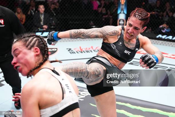 Nora Cornolle of France kicks Melissa Mullins of England in a bantamweight fight during the UFC Fight Night event at UFC APEX on April 06, 2024 in...