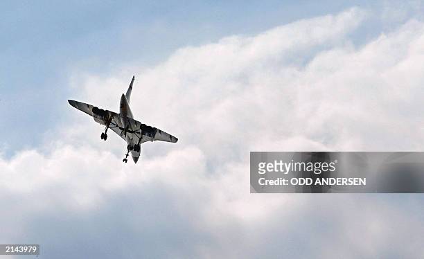 Concorde flies over the Wimbledon Tennis Championships for the last time 06 July, 2003 in Wimbledon, south London. The supersonic jet liner, which...