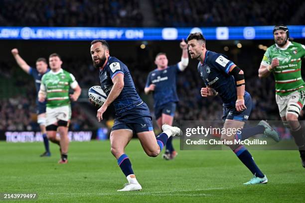 Jamison Gibson-Park of Leinster Rugby scores his team's first try during the Investec Champions Cup Round Of 16 match between Leinster Rugby and...