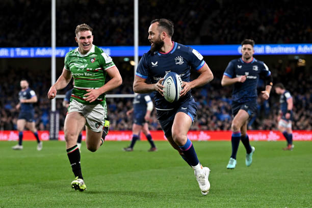 Jamison Gibson-Park of Leinster Rugby scores his team's second try during the Investec Champions Cup Round Of 16 match between Leinster Rugby and...
