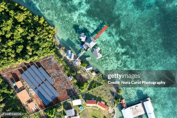 aerial view of solar panel in semporna island - subsidy stock pictures, royalty-free photos & images