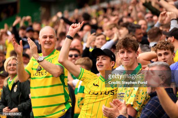 Norwich City fans celebrate victory following the Sky Bet Championship match between Norwich City and Ipswich Town at Carrow Road on April 06, 2024...