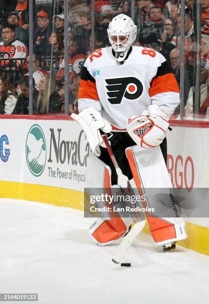 Ivan Fedotov of the Philadelphia Flyers handles the puck behind the net against the New York Islanders at the Wells Fargo Center on April 1, 2024 in...