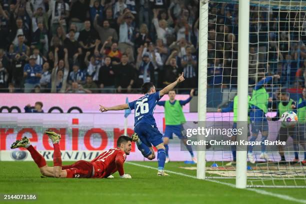 Paul Nebel of Karlsruher SC celebrates after scoring his team`s second goal during the Second Bundesliga match between Karlsruher SC and FC St. Pauli...