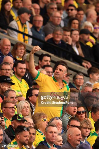 Norwich City fan gestures towards Ipswich Town fans during the Sky Bet Championship match between Norwich City and Ipswich Town at Carrow Road on...