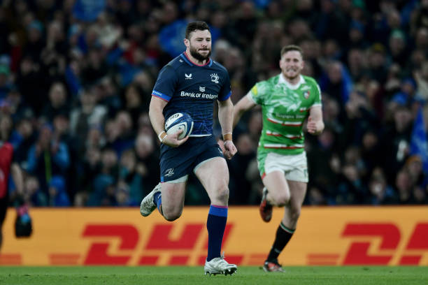 Robbie Henshaw of Leinster Rugby runs to score his team's fourth try during the Investec Champions Cup Round Of 16 match between Leinster Rugby and...