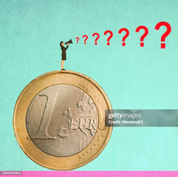businesswoman standing on oversized coin and shouting questions through megaphone - money green background stock illustrations