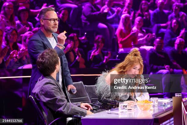 Matthias Opdenhövel, Max Giesinger and Palina Rojinski are seen on stage during the first showing of Season 10 of "The Masked Singer" at MMC Studios...