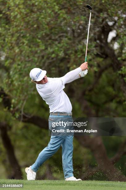 Charley Hoffman of the United States plays his second shoot on the 18th hole during the third round of the Valero Texas Open at TPC San Antonio on...