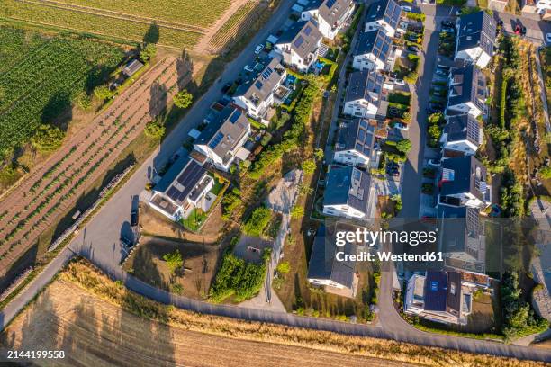 germany, baden-wurttemberg, waiblingen, aerial view of new development area with modern energy efficient houses - westend61 stock-fotos und bilder