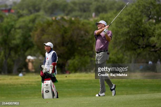 Brendon Todd of the United States plays his second shot on the 11th hole during the third round of the Valero Texas Open at TPC San Antonio on April...