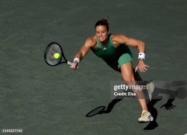 Maria Sakkari of Greece returns a shot to Danielle Collins of the United States during the semifinal match on Day 6 of the WTA 500 Credit One...