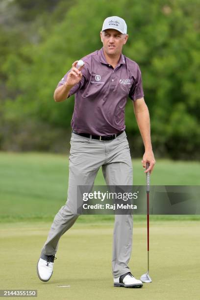 Brendon Todd of the United States acknowledges the crowd after playing his putt shot on the 17th hole during the third round of the Valero Texas Open...