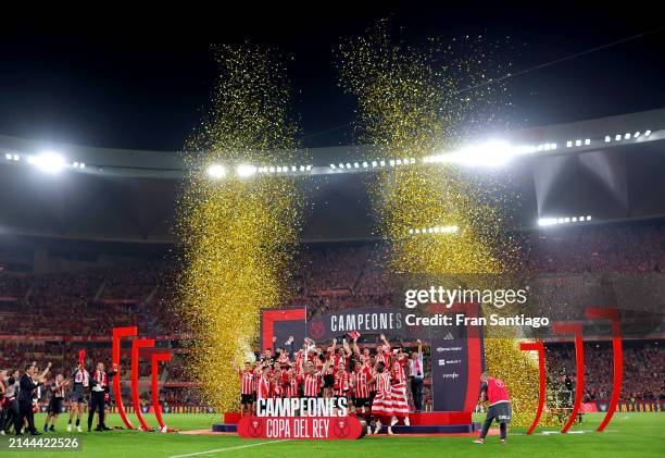 Iker Muniain of Athletic Club lifts the Copa Del Rey trophy in victory following the Copa Del Rey Final between Athletic Club and Real Mallorca at...