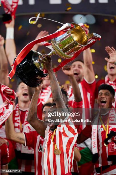 Inaki Williams of Athletic Club, lifts the Copa Del Rey trophy in celebration of victory following the Copa del Rey Final between Athletic Club and...