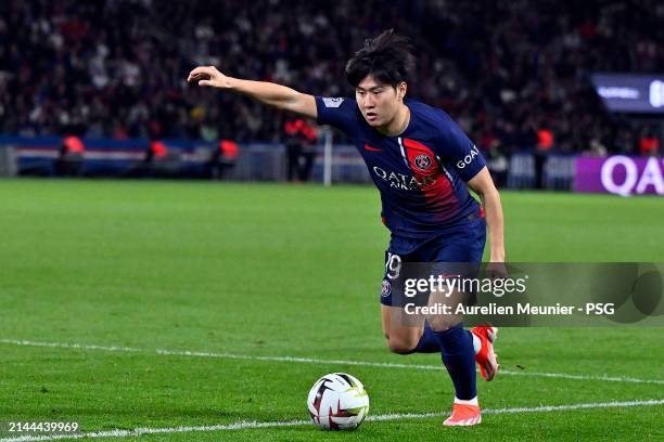 Lee Kang I of Paris Saint-Germain runs with the ball during the Ligue 1 Uber Eats match between Paris Saint-Germain and Clermont Foot 63 at Parc des...