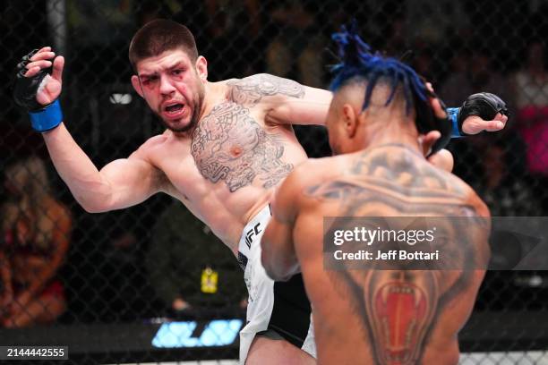 Chepe Mariscal kicks Morgan Charriere of France in a featherweight fight during the UFC Fight Night event at UFC APEX on April 06, 2024 in Las Vegas,...