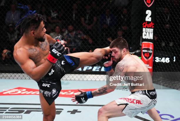 Morgan Charriere of France kicks Chepe Mariscal in a featherweight fight during the UFC Fight Night event at UFC APEX on April 06, 2024 in Las Vegas,...