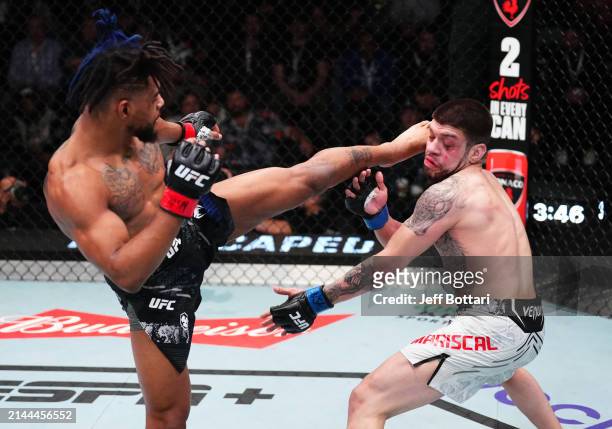 Morgan Charriere of France kicks Chepe Mariscal in a featherweight fight during the UFC Fight Night event at UFC APEX on April 06, 2024 in Las Vegas,...
