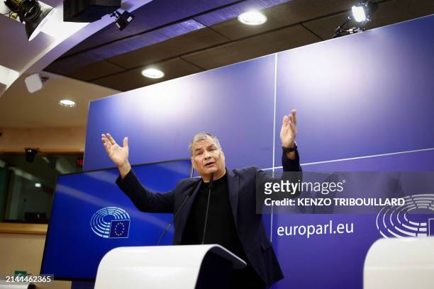Ecuador's former President Rafael Correa delivers remarks denoucing Ecuadorian authorities' storming of the Mexican embassy in Quito, during a press...