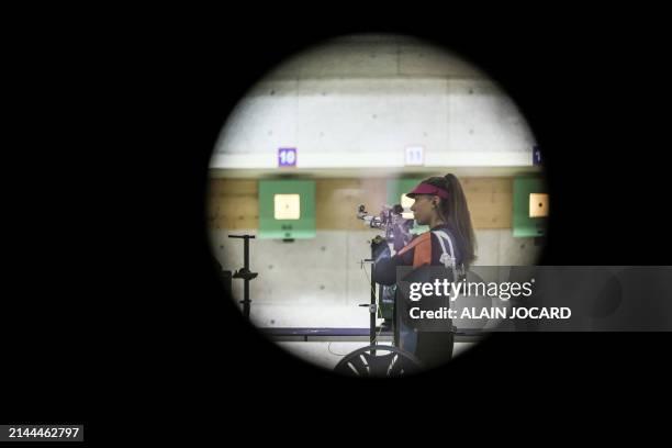 An athlete competes in the 10m air rifle mixed team qualification as part of a test event ahead of the Paris 2024 Olympic Games shooting event at the...